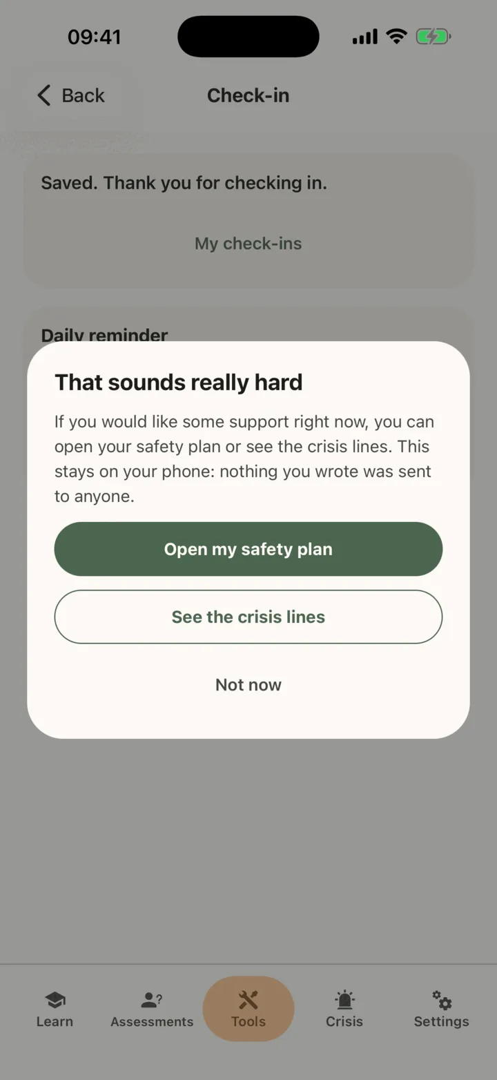 The That sounds really hard card over the check-in screen, with the buttons Open my safety plan, See the crisis lines and Not now